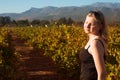 Blonde woman in the vineyards Royalty Free Stock Photo