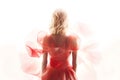 Blonde Woman Wearing a Soft Red Silk Dress Looking Like a Rose Flower Royalty Free Stock Photo