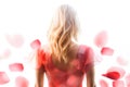 Blonde Woman Wearing a Soft Red Silk Dress Looking Like a Rose Flower Royalty Free Stock Photo