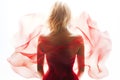 Blonde Woman Wearing a Soft Red Silk Dress Looking Like a Rose Flower Royalty Free Stock Photo