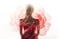 Blonde Woman Wearing a Soft Red Silk Dress Looking Like a Rose Flower Royalty Free Stock Photo