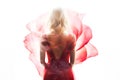 Blonde Woman Wearing a Soft Red Silk Dress Looking Like a Rose Flower Royalty Free Stock Photo