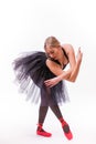 Blonde young beautiful ballet dancer isolated over white background. Royalty Free Stock Photo