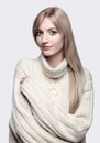 Blonde woman in cashmere sweater Royalty Free Stock Photo