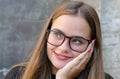 Woman wearing glasses and laughing, with red lips and nails Royalty Free Stock Photo