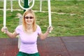 Blonde Young Woman Working Out Outdoors