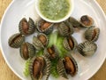 Steamed Blood cockles with Thai green spicy sauce Royalty Free Stock Photo