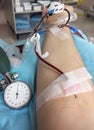 Blood donor when donating blood in hospital bed