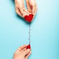 Blood donor. Hands with red heart and drop. Medical donation and blood transfusion