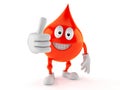 Blood drop character with thumbs up gesture Royalty Free Stock Photo