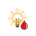 Blood drop icon with Light bulb and rays shine icon. Energy and idea symbol isolated