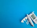 Blood glucose meter test strips sugar and syringe for diabetes monitoring with copy spac Royalty Free Stock Photo