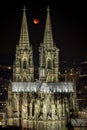 Blood moon between Cologne cathedral