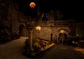 Blood moon over medieval city. Royalty Free Stock Photo