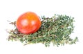 Blood orange and bundle of fresh thyme with green leaves isolated on white background