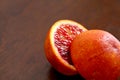 A blood orange cut in two halves Royalty Free Stock Photo