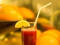 Blood orange juice decorated with a slice of lemon. Royalty Free Stock Photo