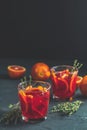 Blood Orange Sparkling Vodka cocktail on black concrete background Royalty Free Stock Photo