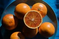 Blood oranges on blue Royalty Free Stock Photo