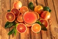 Blood Oranges Juice With Fresh Fruit On Wooden Background