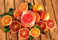 Blood Oranges Juice With Fresh Fruit On Wooden Background