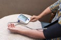 Blood pressure measure with heart rate check using digital device Royalty Free Stock Photo