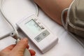 Blood pressure measurement with a tonometer. Cuff for air, pear for inflation, connecting ducting soft rubber tubes