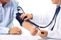 Blood pressure measuring. Doctor and patient. Royalty Free Stock Photo