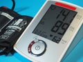 Blood pressure monitor cuff upper arm. High blood pressure machine. Royalty Free Stock Photo