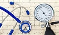 Blood pressure monitor, stethoscope and EKG curve