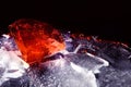 Blood red diamond on black ice. Royalty Free Stock Photo