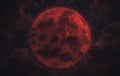Dramatic Blood Moon in Dark Night Sky with Clouds Royalty Free Stock Photo