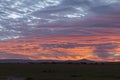 Blood red Sunrise Sky over Masai Mara Plains ,Kenya