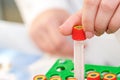 Blood sample tubes in hands Royalty Free Stock Photo