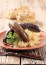Blood sausage and white pudding with sauerkraut Royalty Free Stock Photo
