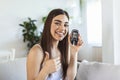 Blood sugar testing at home. Checking Blood Sugar Level At Home. Diabetic Checking Blood Sugar Levels. Woman checking blood sugar Royalty Free Stock Photo