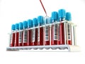 Blood test samples tubes and blood test pipette adding fluid to one of tubes iisolated on white