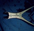 Bloodied medical instrument forceps on tissue Royalty Free Stock Photo