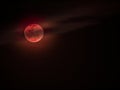 Bloodmoon or red moon with cloud on dark sky Royalty Free Stock Photo