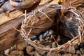 Bloodstained crown of thorns on a wooden cross Royalty Free Stock Photo