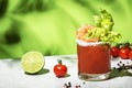 Bloody Caesar alcoholic cocktail drink, version of Bloody Mary with tomato juice, vodka, clam broth, celery, hot sauce and ice in Royalty Free Stock Photo