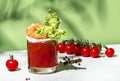 Bloody Caesar cocktail drink, Bloody Mary variation with tomato juice, vodka, clam broth, celery, hot sauce and ice in glass. Royalty Free Stock Photo