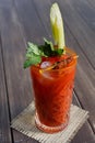 Bloody mary cocktail garnished with celery, popular alcohol drink Royalty Free Stock Photo
