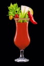 Bloody mary, a cocktail made with vodka, tomato juice, lemon juice, Worcestershire sauce, tabasco and pepper, isolated black Royalty Free Stock Photo