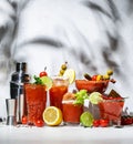 Bloody Mary, Joseph, Caesar and other red cocktails set with tomato juice, vodka, hot sauce and celery. Cocktail party. Gray Royalty Free Stock Photo