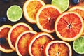 Bloody oranges and limes close up