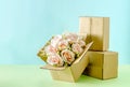 Blooming bouquet of pink roses in a cardboard box Royalty Free Stock Photo