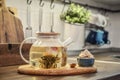 Blooming flowering tea in glass teapot