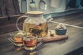 Blooming flowering tea in glass teapot Royalty Free Stock Photo