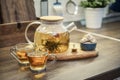 Blooming flowering tea in glass teapot Royalty Free Stock Photo